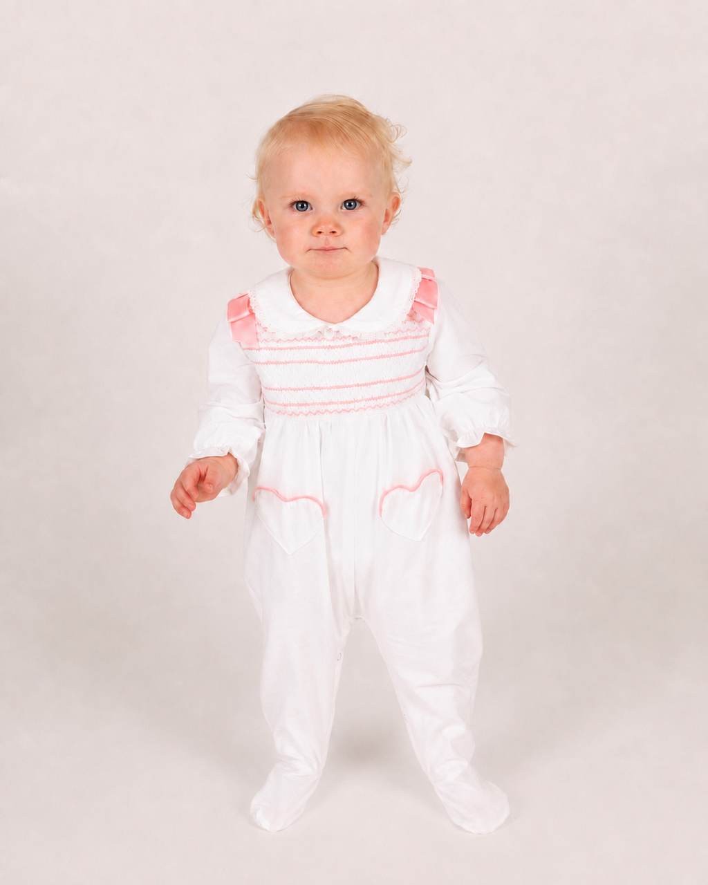Blush Pink Hand-Smocked Babygrow