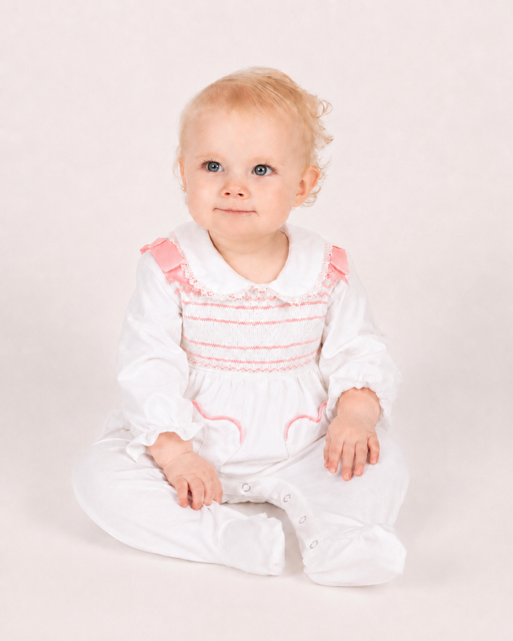 Blush Pink Hand-Smocked Babygrow